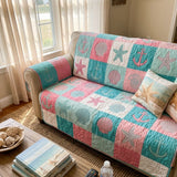 Gestepptes Sofaüberwurf mit Strandmotiv NCU0DV9510